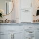 a beautiful bathroom with custom cabinetry