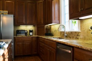 granite countertop on cherry cabinets